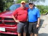 Hole sponsors Paul and Greg Tomko, with a Dodge truck they offered as a hole-in-one prize