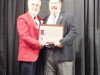 Enshrinee Tom Bauer, right, accepts his plaque from LSHOF president Tom Skoch 5.12.16