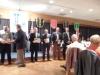 Members of the 1990 Lorain Catholic Baseball Team receive congratulations from LSHOF Committee Member Bob Tomaszewski