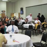 Guests socialize at the LSHOF Steak Fry Aug. 3.