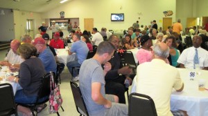 Guests socialize at the LSHOF Steak Fry Auyg. 3.