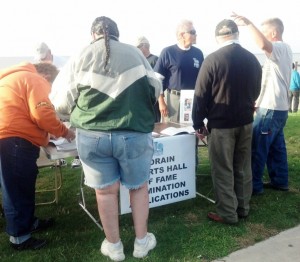 The Lorain Sports Hall of Fame table at the Lorain City Schools Homecoming Bonfire offered visitors a chance to learn more about the organization, as well as pick up forms to nominate Lorain athletes for a spot in the hall of fame.