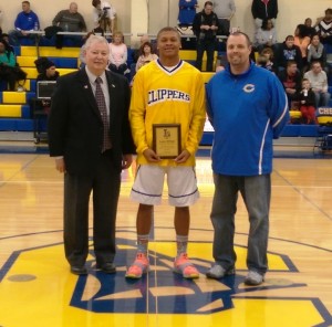 Lance Billings of Clearview High School was presented with a plaque to honor him for being named 1st Team Div. IV All-Ohio Receiver -- it's the second year in a row he has received All-Ohio honors. Presenting the plaque was Dave Simpson, left, president of the Lorain Sports Hall of Fame Committee. Also with Lance is Clearview Athletic Director Mike Collier.