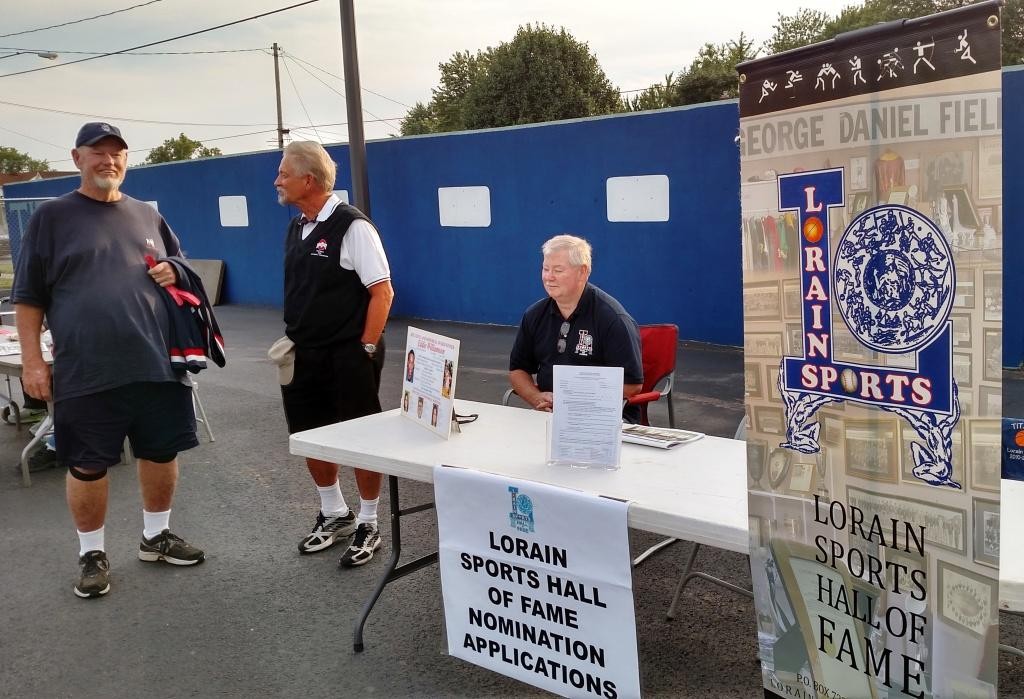 The Lorain Sports Hall of Fame attended the Lorain Titans first home game on Aug. 28, 2015, offering nomination forms for the public to suggest athletes who they think should be inducted in the hall of fame. Pictured are LSHOF Committee member Terry King, left, Vice President Bill Rufo and Past President Dave Simpson. (Photo by Tom Skoch, LSHOF president) 