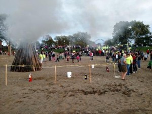 A large crowd gathered on the hillside overlooking Lakeview Beach as the 2015 Homecoming Bonfire was lit.