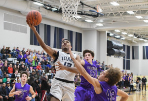 Lorain guard Jalil Little had a game-high 21 points in the Titans' 66-57 season-opening win over the Vermilion Sailors, Dec. 6, 2016. It was the first regular-season boys basketball game ever played in the gym at the new Lorain High School. (Morning Journal Photo by Eric Bonzar)